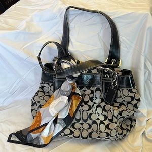 Black and silver Coach purse with matching scarf. Excellent condition.